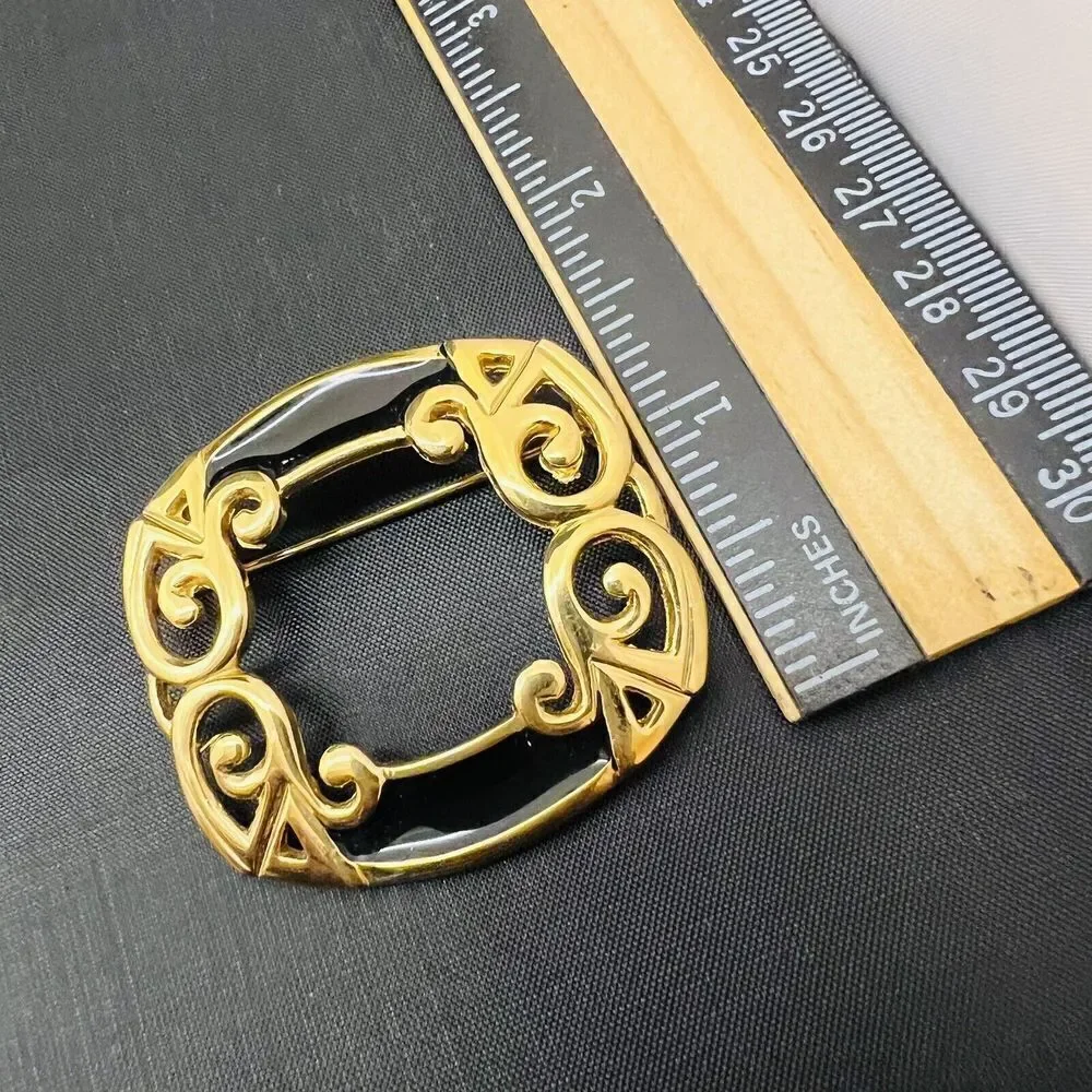 Vintage GINNIE JOHANSEN Gold Tone Black Enamel Brooch Open Work 4093